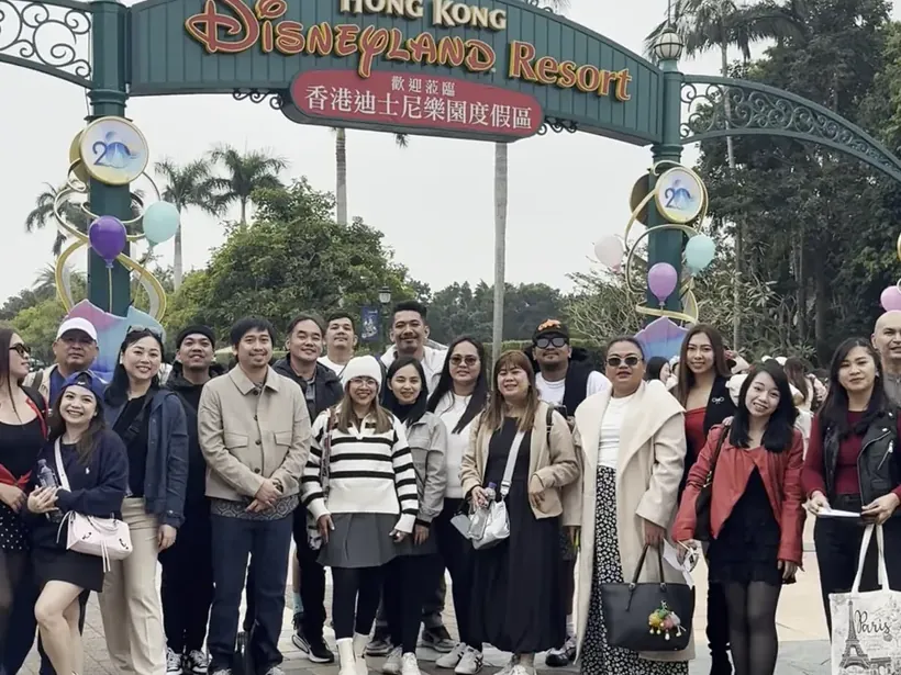 Our Hong Kong tour group at the Hong Kong Disneyland Resort gate